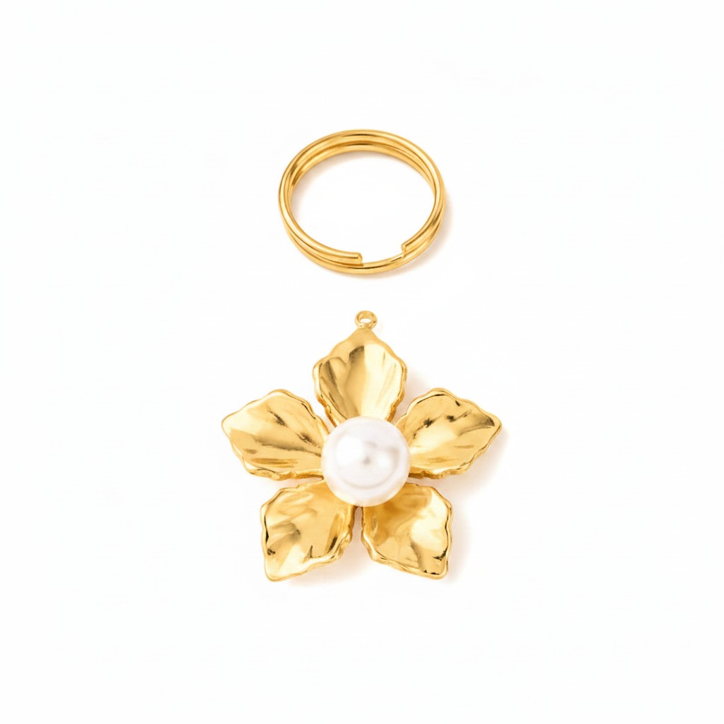 Blomma med pärla